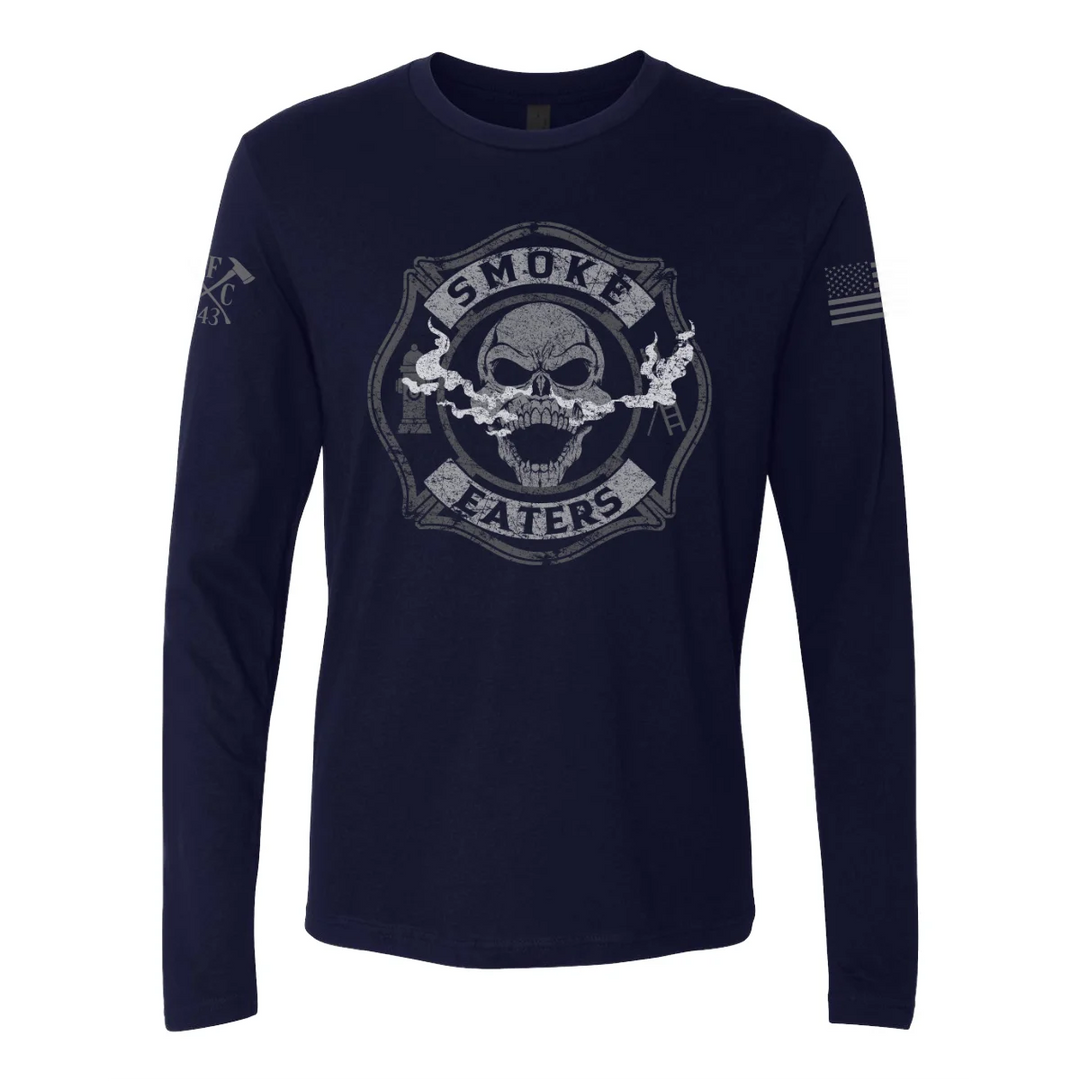 Front view of firefighter long sleeves in navy color featuring a full-front design print of a skull inhaling smoke, with a distressed grey and off-white look.