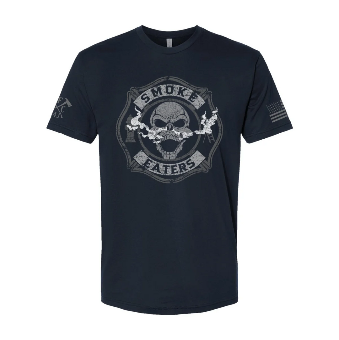 Front view of firefighter T-Shirt in navy color featuring a full-front design print of a skull inhaling smoke, with a distressed grey and off-white look.