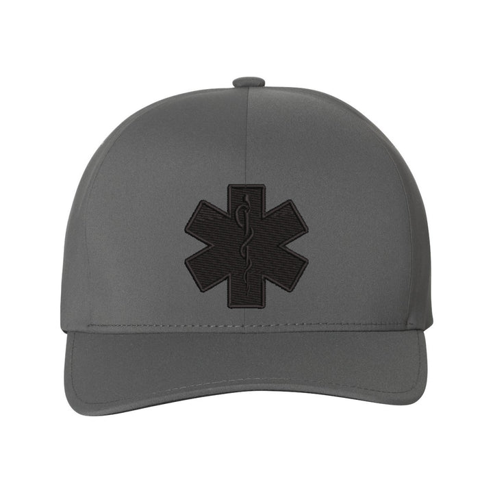 Close-up view of the black Star of Life emblem on the front panel of the Delta FlexFit hat.