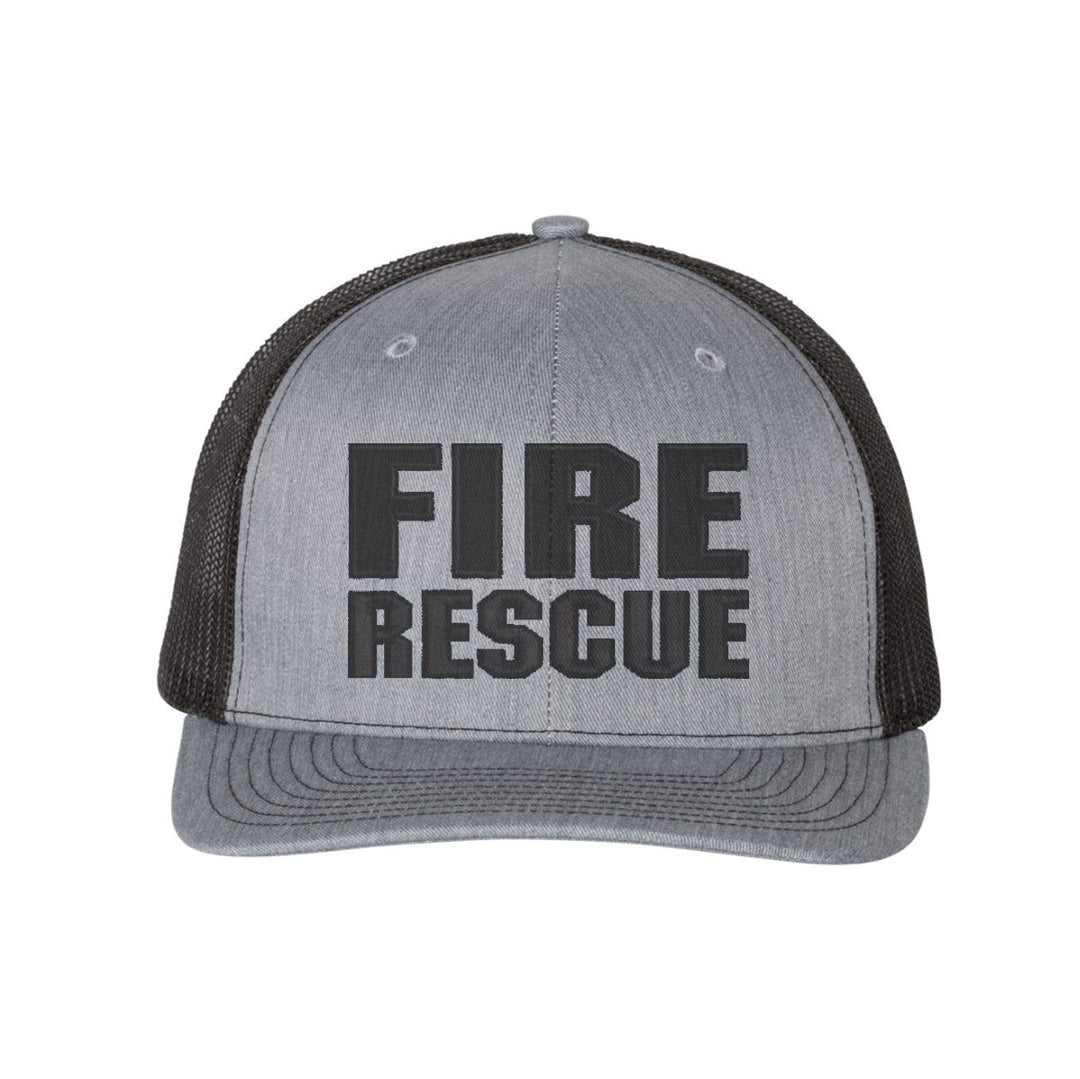 Close-up of the embroidered "Fire Rescue" logo on the front of the Blackout Snapback Trucker Hat.