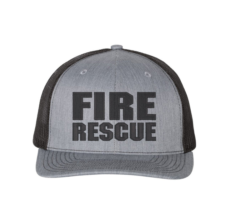 Close-up of the embroidered "Fire Rescue" logo on the front of the Blackout Snapback Trucker Hat.