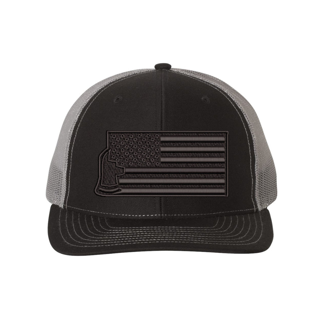 Close-up of the embroidered "Thin Red Line Axe Maltese" logo on the front of the Blackout Delta FlexFit Hat, highlighting the sharp design details.