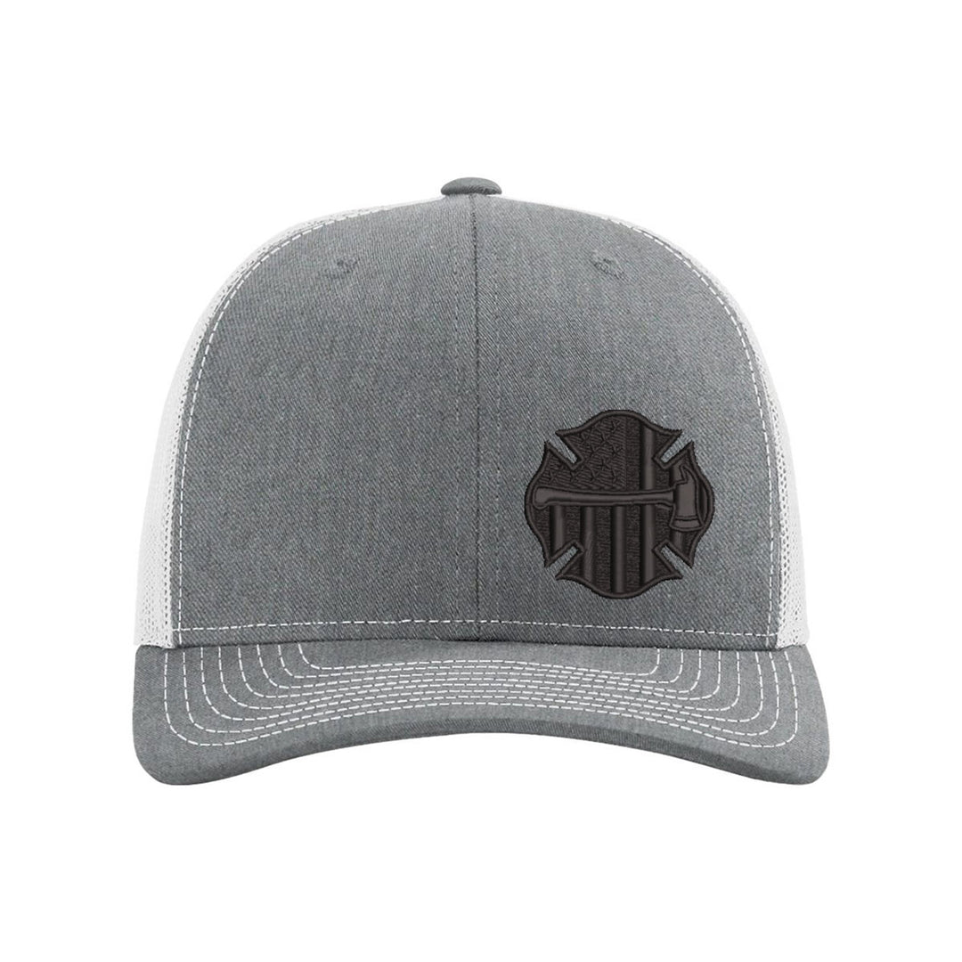 Close-up shot of the Thin Red Line Axe Maltese Blackout Snapback Trucker Hat’s intricate embroidery, focusing on the axe and Thin Red Line details.