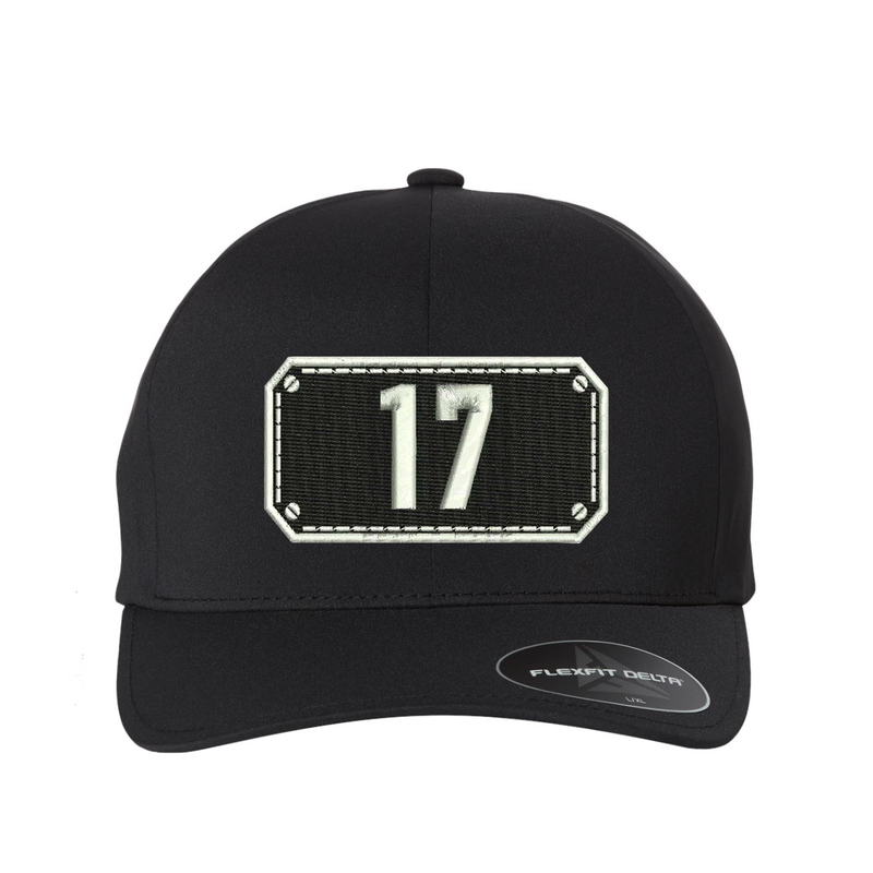 Black Shield design on a Delta Flexfit hat with your fire station number embroidered in the shield.  Hat color black.
