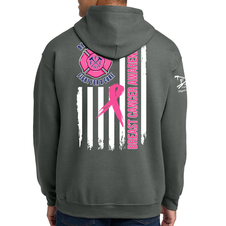 A person shown from the back wearing a dark gray hoodie with a large breast cancer awareness graphic on the back. color_charcoal