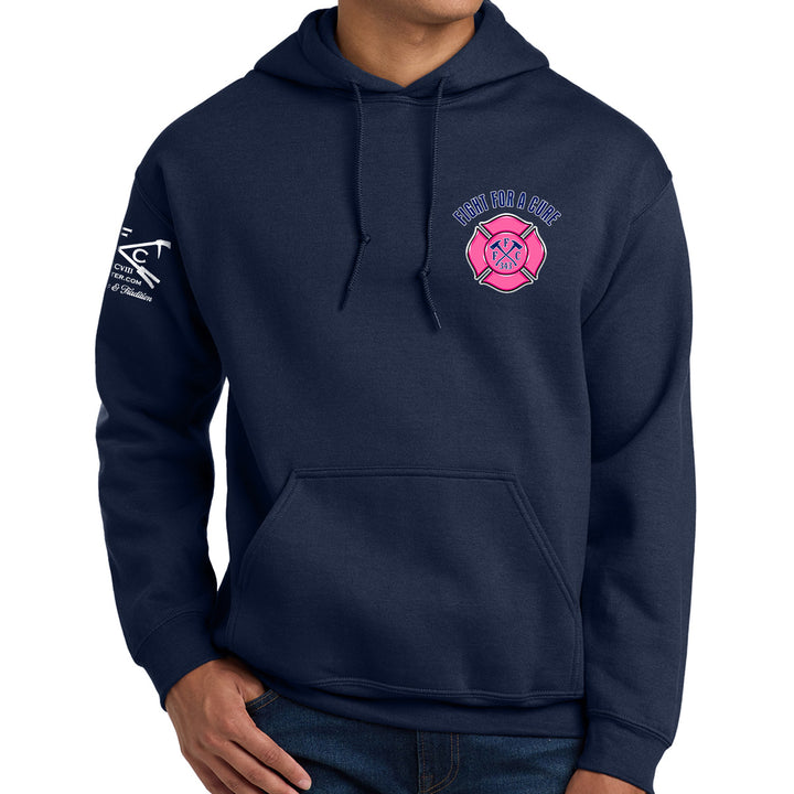 A navy blue pullover hoodie worn by a model, featuring a breast cancer awareness design #color_navy