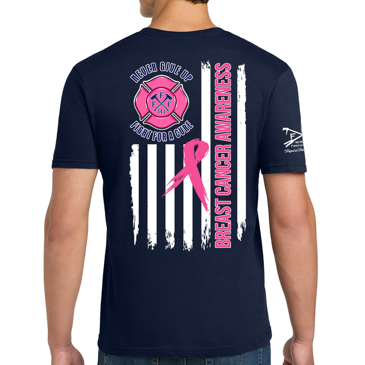 A man wearing a navy blue t-shirt, viewed from the back. The shirt features a breast cancer awareness design with a pink ribbon, a pink Maltese cross #color_navy