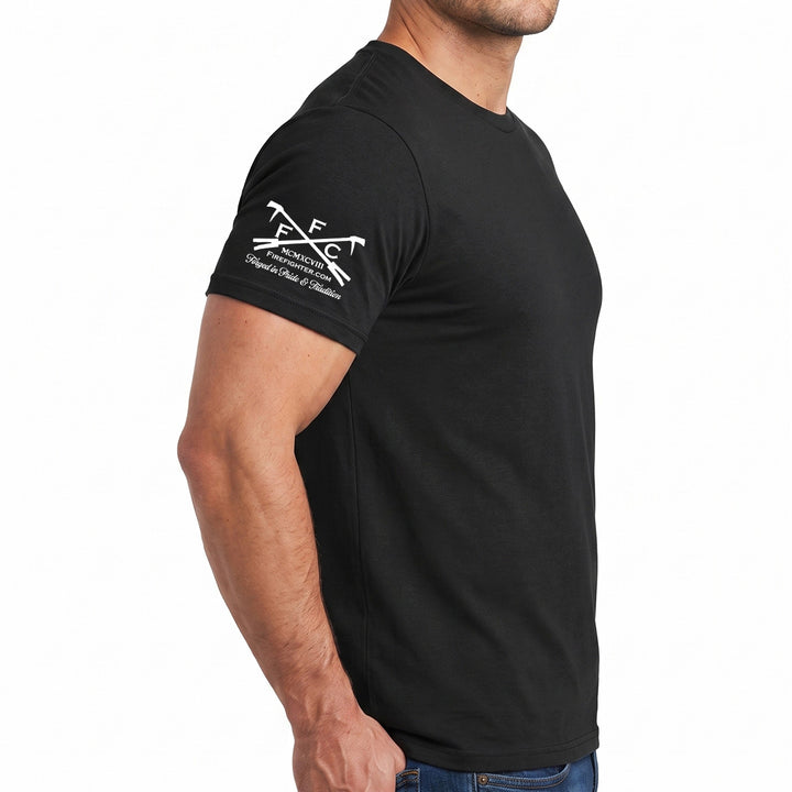 A man wearing a black short-sleeve t-shirt with a white graphic logo on the left sleeve, shown from a side profile against a white background. #color_black