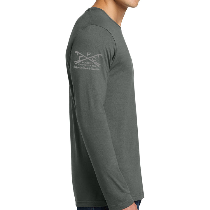 A man wearing a dark gray long-sleeve t-shirt with a light gray crossed hammers and wrenches logo on the left shoulder, shown in a side profile view against a white background. #color_charcoal