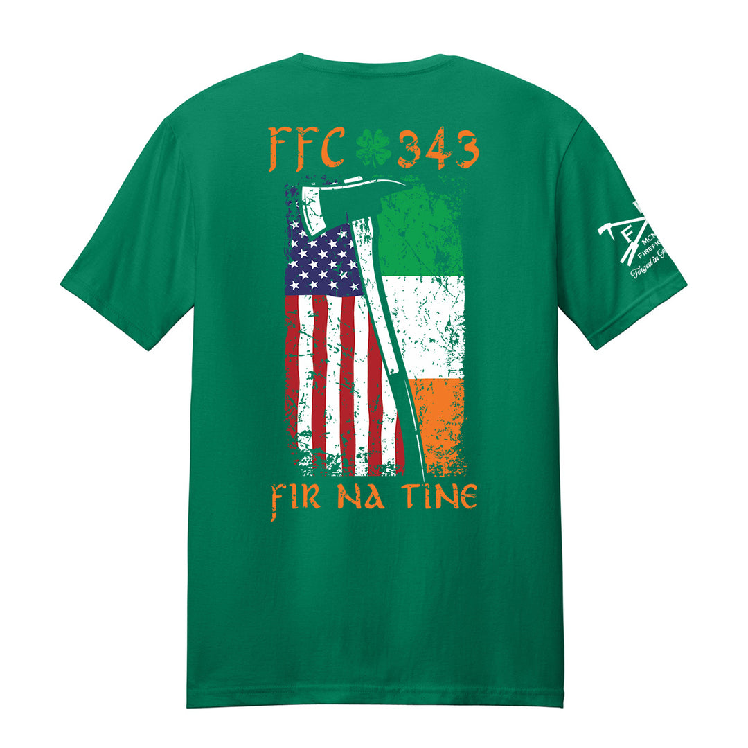 A green short-sleeve t-shirt shown from the back, featuring a distressed graphic of the American flag and the Irish flag with the text 'FFC 343' and 'FIR NA TINE' in orange, plus a white graphic on the left sleeve. #color_kelly-green