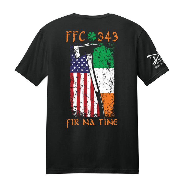 Black short-sleeve t-shirt shown from the back, featuring a distressed graphic of the American flag and Irish flag with an axe, plus orange text reading 'FFC 343' and 'FIR NA TINE'. A white graphic is printed on the left sleeve. #color_black