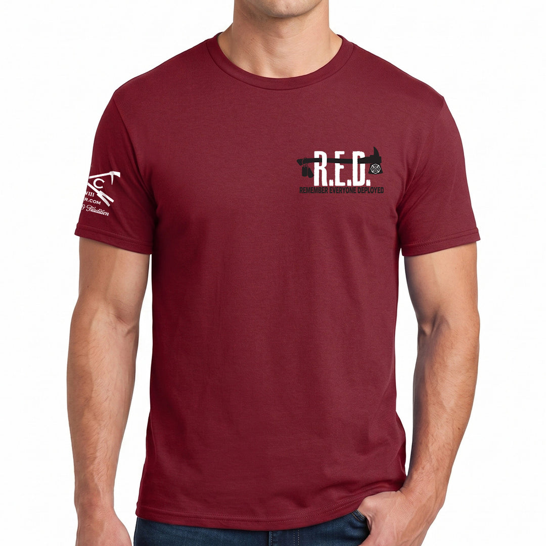 A man wearing a maroon short-sleeve t-shirt with the RED Friday Firefighter graphic tee