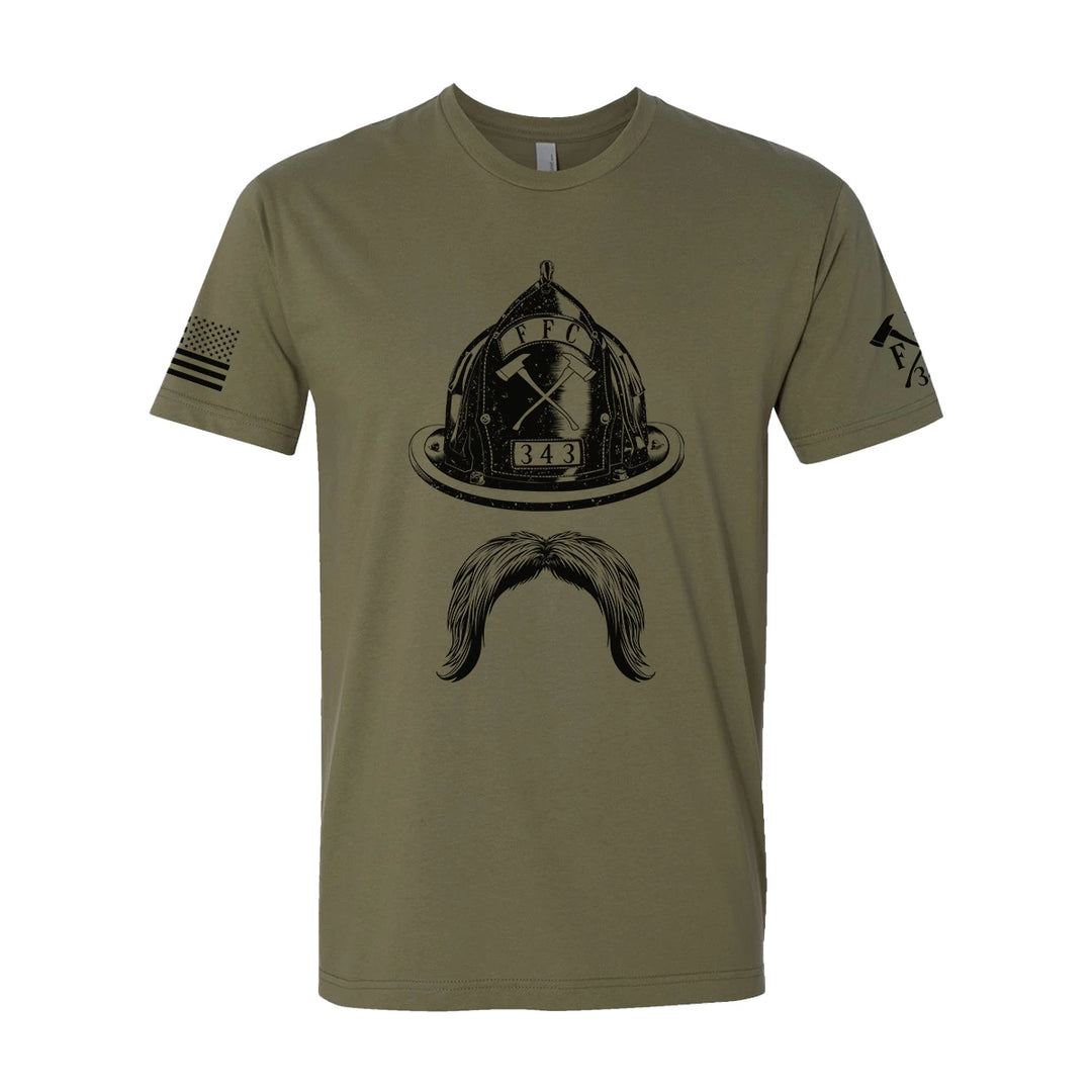 Front view of firefighter T-Shirt in military green color with a full  front print of Firefighter helmet and a mustache design perfect for fire department apparel.