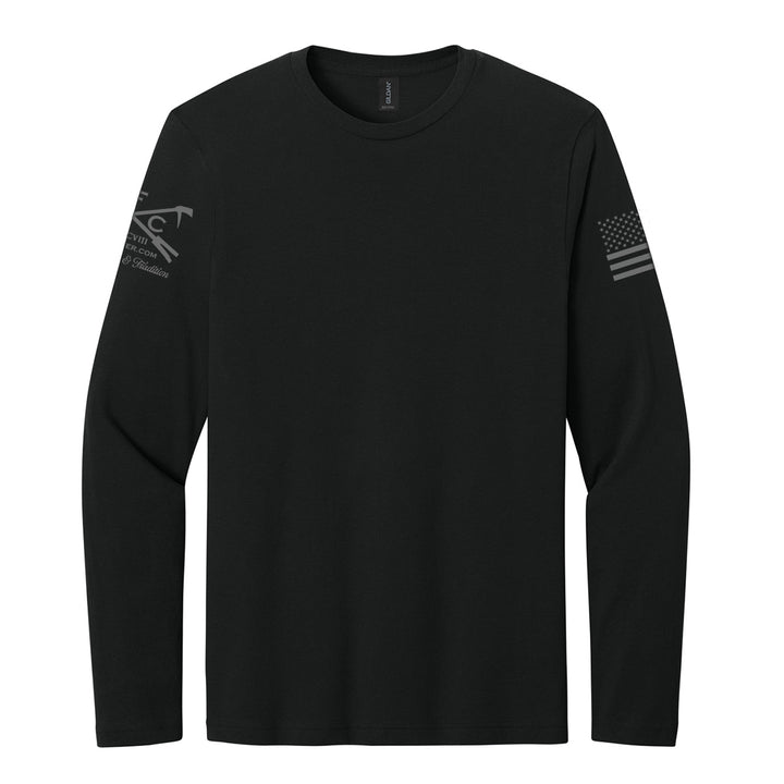 A black long-sleeve crewneck t-shirt with a dark gray tactical logo on the right sleeve and a dark gray American flag graphic on the left sleeve, displayed on a solid white background.  #color_black
