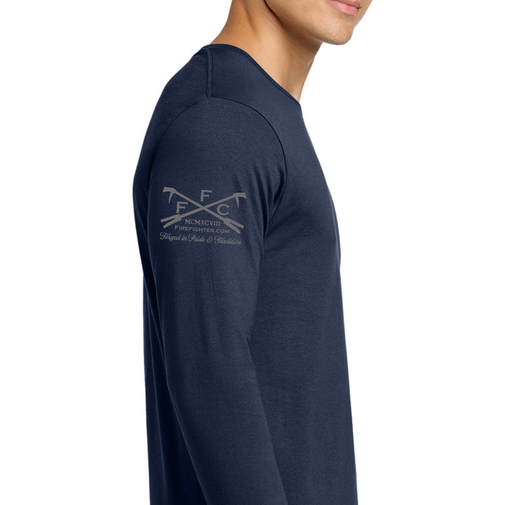 A man wearing a navy long-sleeve t-shirt, shown from the side profile against a plain white background. The shirt features a light gray printed logo on the upper left chest with crossed golf clubs and the text ffc #color_navy