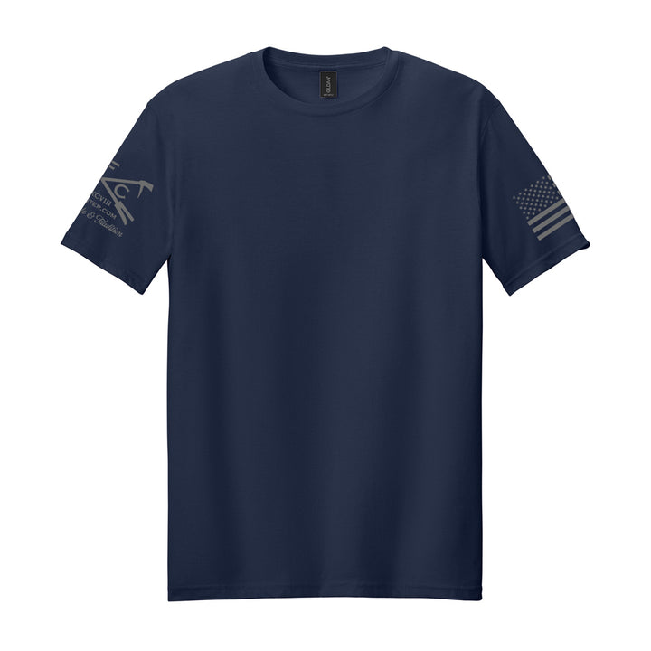 A navy blue short-sleeve crewneck t-shirt with a dark gray graphic on the left sleeve and a distressed American flag graphic on the right sleeve, displayed on a solid white background. #color_navy
