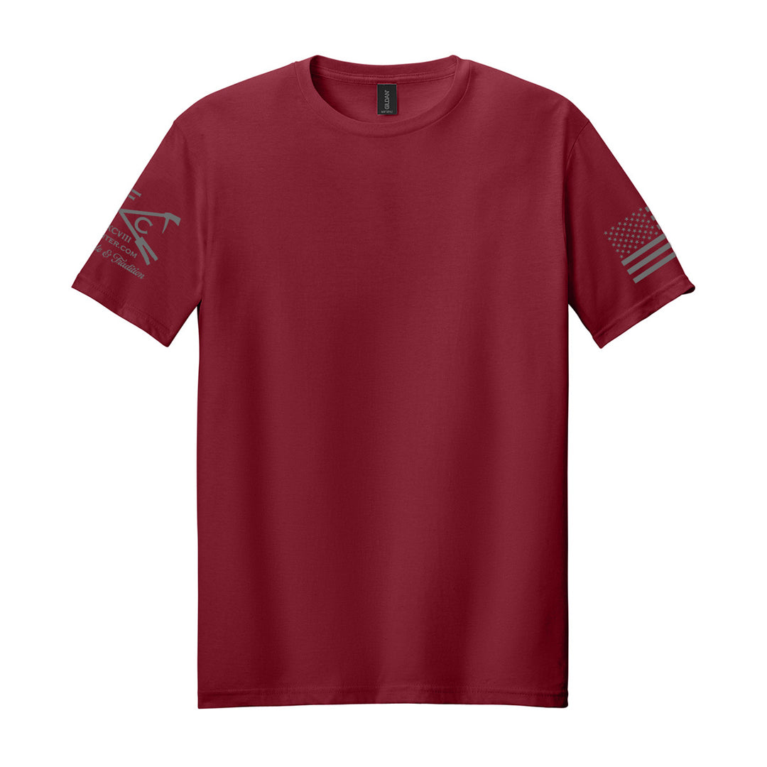 A short-sleeve crewneck t-shirt in maroon red, featuring a dark gray graphic on the right sleeve and a distressed American flag design on the left sleeve, displayed against a solid white background. #color_cardinal-red