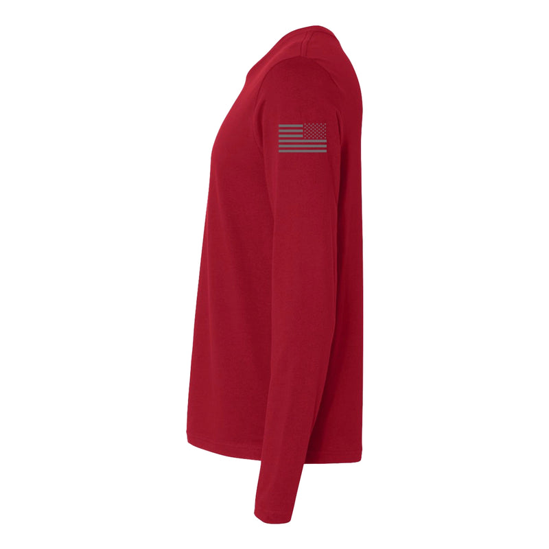 Left side view of a firefighter long sleeves in cardinal red  with the USA  flag printed.