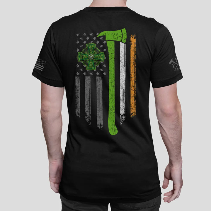 A man wearing showing the full back design of firefighter graphic t-shirt featuring a distressed USA flag accented by a green axe