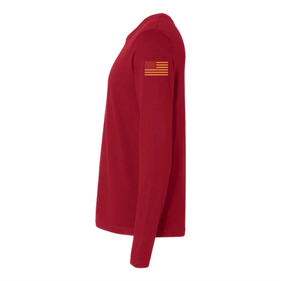 Left side view of a firefighter long sleeves in cardinal red color with the USA  flag printed.