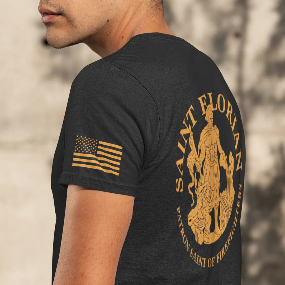 A man wearing showing the full back design of firefighter graphic t-shirt featuring the Saint Florian Patron Saint of Firefighters