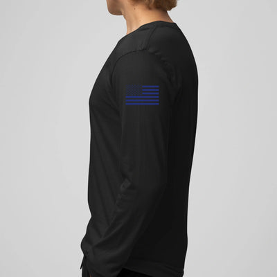 Left side view of a firefighter long sleeves in navy color with the USA  flag printed.