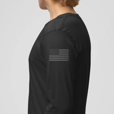 Left side view of a firefighter long sleeves in black color with the USA flag printed.