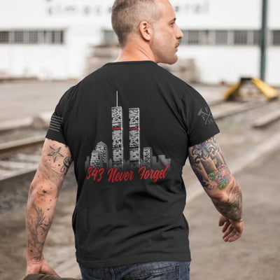 a man wearing a black 9/11 firefighter t-shirt in black color featuring full-back design of the Twin Towers, with "343 Never Forget" 