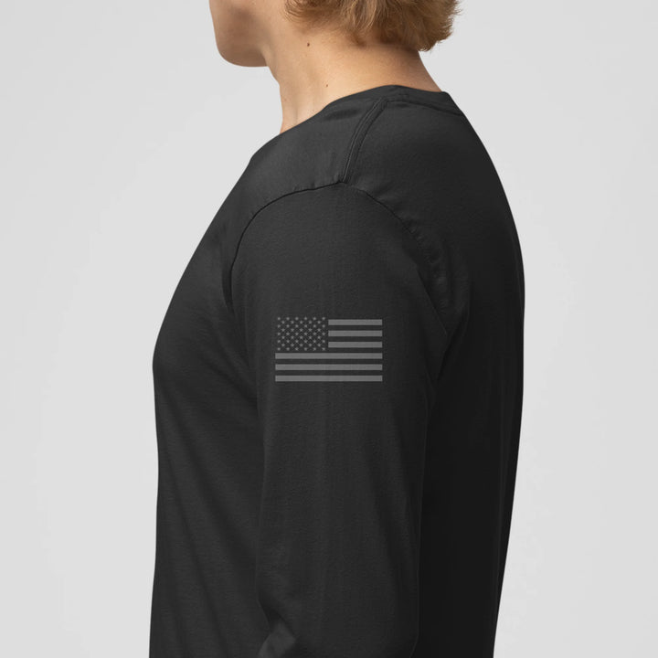 Left side view of a 9/11 Never Forget firefighter long sleeves in black color with the USA flag printed.