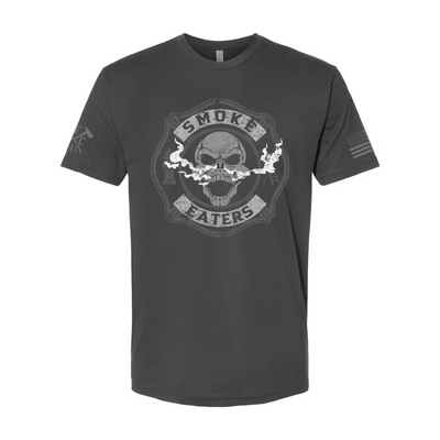 Front view of firefighter T-Shirt in heavy metal color featuring a full-front design print of a skull inhaling smoke, with a distressed grey and off-white look. 