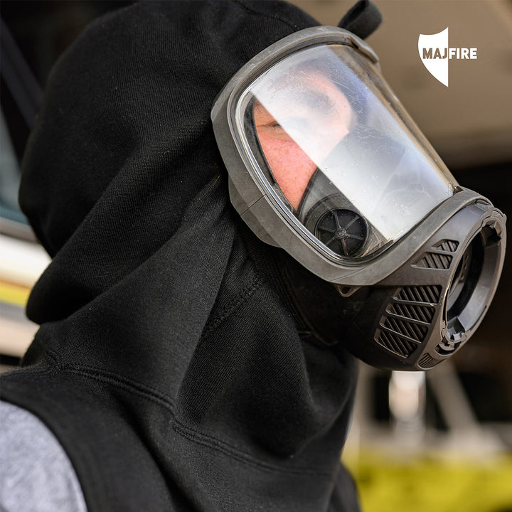 Firefighter wearing MajFire FORTEX Nomex Nano Flex hood with SCBA facepiece on the fireground