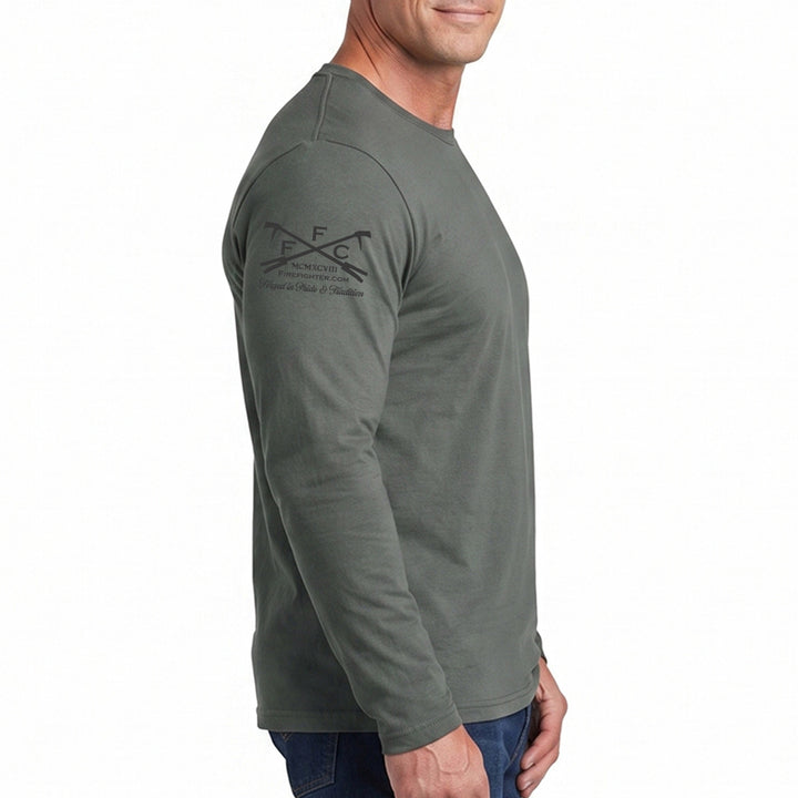 A man wearing a long-sleeve crewneck t-shirt in olive green, shown from a side profile against a plain white background. The shirt features a black printed logo on the upper left shoulder. #color_charcoal