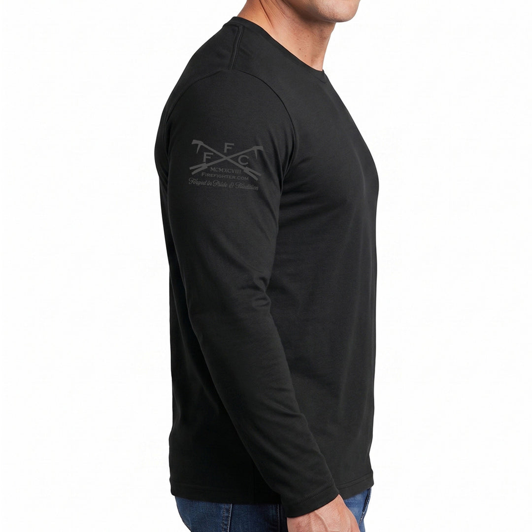 A man wearing a black long-sleeve crewneck t-shirt with a dark gray crossed axes logo on the left shoulder, shown in a side profile view against a white background. #color_black