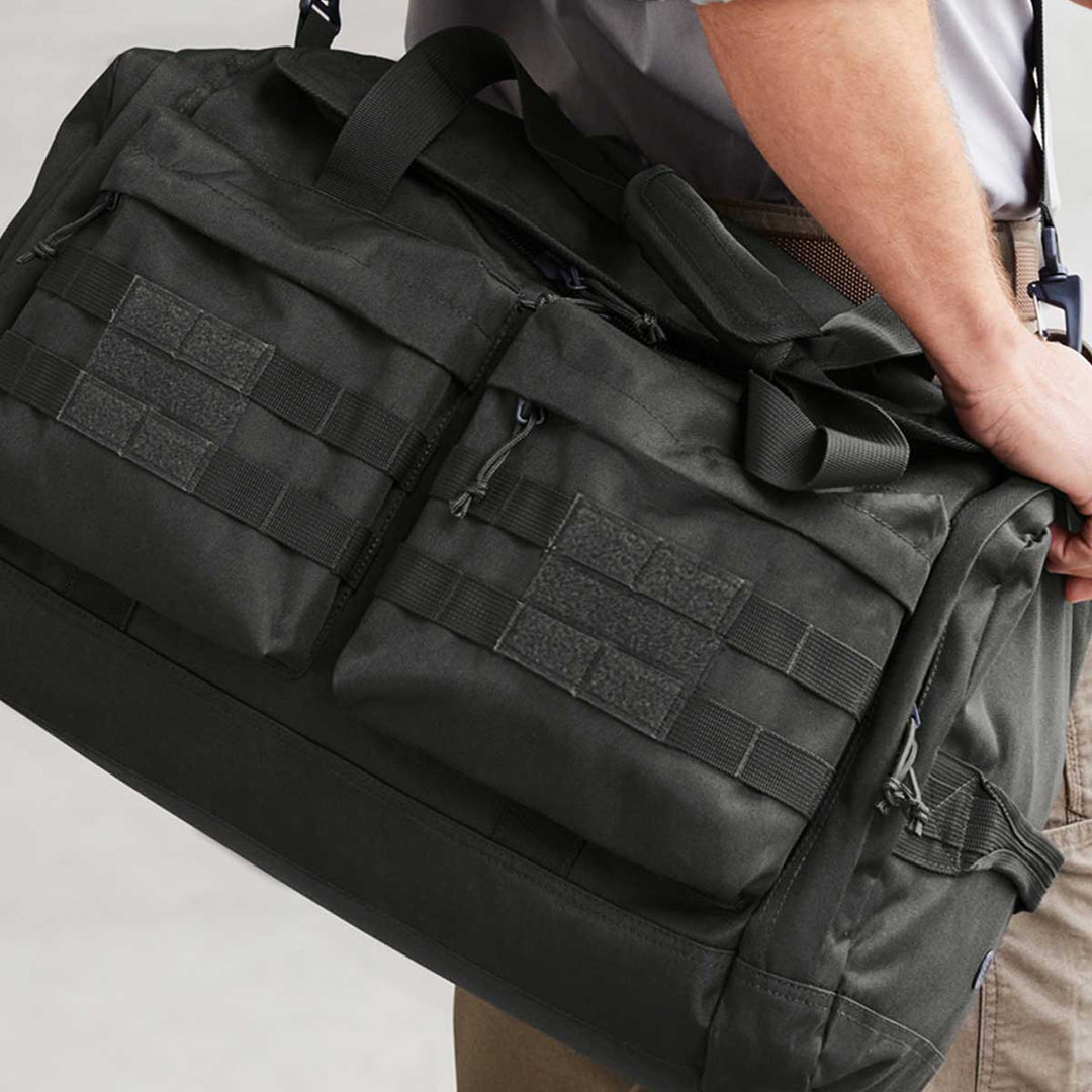 Rugged duffel bag designed for firefighters, perfect for gym, travel, or duty shifts.