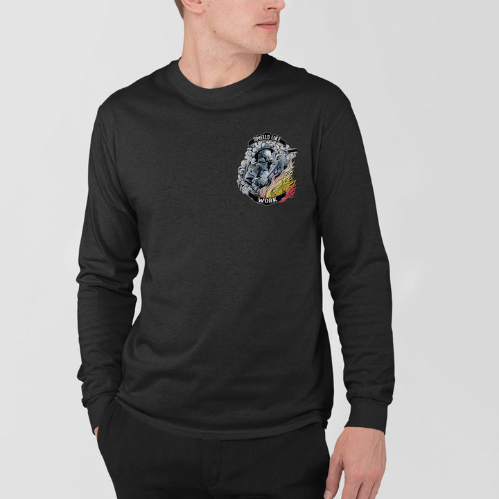 Firefighter long sleeve t-shirt with bold "Smells Like" and "Work" text and halligan bar graphic.