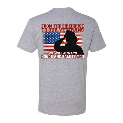 Firefighter saluting in front of distressed American flag on tribute t-shirt