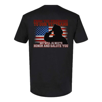 Firefighter saluting in front of USA flag with grunge effect on premium t-shirt