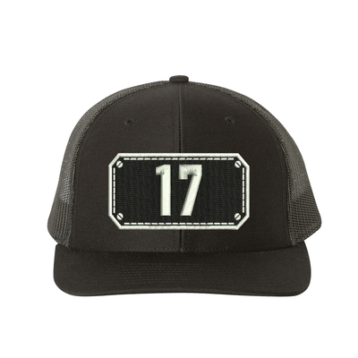 Richardson Trucker Hat.  Black Shield design with your fire station number embroidered in the shield.  Hat color black/black.