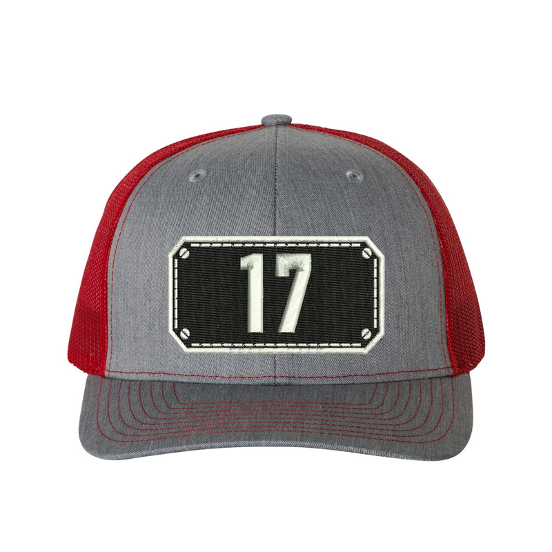 Richardson Trucker Hat.  Black Shield design with your fire station number embroidered in the shield.  Hat color heather grey/red.