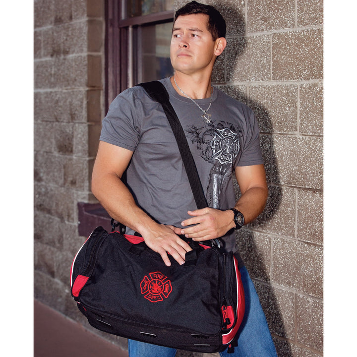 Firefighters over night duffel bag