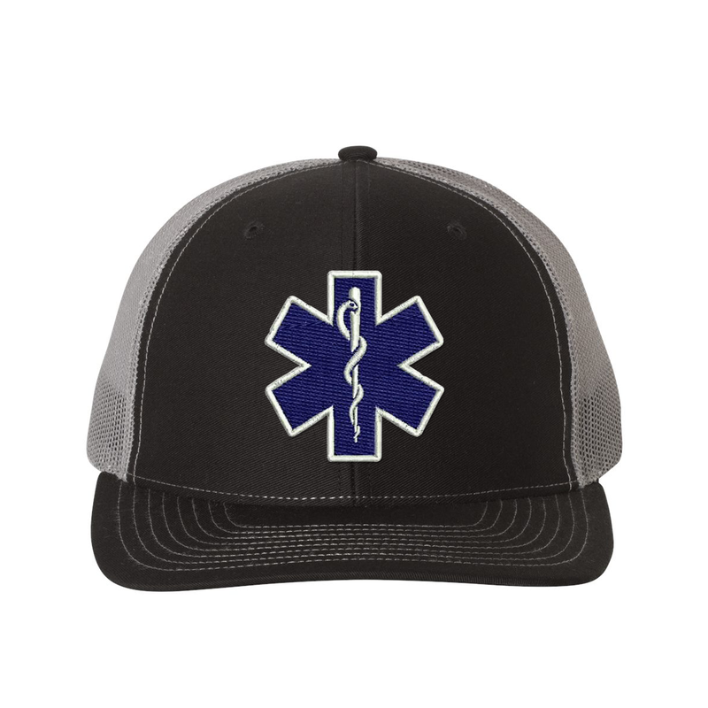 Embroidered  Richardson Trucker Star of Life logo hat.  The Star of Life logo is embroidered in royal blue thread with a white outline. Hat color black/charcoal.